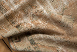 Distressed Oushak rug's pile texture with mostly even wear in muted beige and copper.