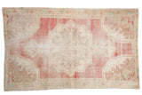Vintage distressed Oushak rug, large medallion with pearl design, faded red, ivory, 4'5