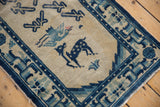 Hand-knotted Peking runner with cobalt pictorial deer, bird motifs, geometric border.