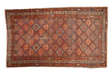 Antique hand-knotted Kurdish Malayer rug, madder red, sapphire blue geometric guls.