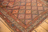 Antique Kurdish Malayer rug corner, displaying geometric guls and traditional boteh borders.