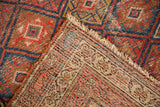 Hand-knotted foundation of antique Kurdish Malayer rug with visible weave and secure fringe.