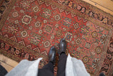 Antique Kurdish Bijar rug with distinctive Mina Khani design, showcasing its rich palette and storied patina.