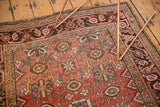Antique Kurdish Bijar rug detail: Mina Khani trellis, blush, gold, green hues, and storied wear.