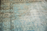 Distressed vintage Mahal rug pile with powder blue abrashes and visible foundation.