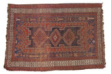 Antique Afshar rug, triple medallion, geometric motifs, madder red, navy, and ivory.
