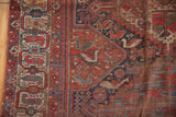 Antique Qashqai rug: geometric border, rich field with visible stylized birds.