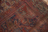 Visible foundation and detailed spandrel design of a collectible antique Qashqai rug.