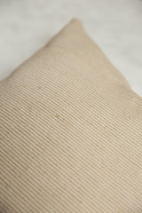 Natural woven jute and cotton pillow fabric with delicate subtle stripes.