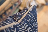 Unique jute and linen piping on indigo mudcloth print fabric.