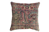 Antique Persian Kerman rug fragment throw pillow with muted red, blue, cream floral design, 18x18.