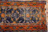Vintage Chinese Hamadan rug, worn cobalt blue field showing foundation, tattered tangerine border.