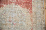 Evenly worn pile on a vintage distressed Oushak rug revealing the woven foundation.