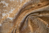 Distressed vintage Oushak rug showing soft folds, visible knot heads, and abrashed beige pile.