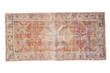 Distressed vintage Oushak runner, diamond medallion, sprawling leaves, copper, ivory, blues, greens.