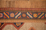 Vintage Serab rug, geometric borders in camel, sky blue, tangerine; lattice field shows faint foundation.