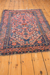 Vintage Malayer rug corner, navy blue meandering vine boteh border, Herati field.
