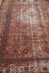Antique Malayer runner, Herati and floral pomegranate motifs, madder root red, with distinct knot head wear.