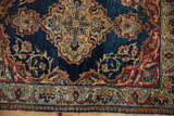 Antique Kermanshah rug border with reciprocating pawn motif, navy, wine red, dusty gold vinery.
