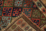 Antique Bagface Jaff Kurd rug corner, revealing brick red geometric patterns, original selvage, and hand-knotted foundation.