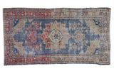 Vintage Distressed Oushak rug; dusty navy blue field, faded red florals, scalloped medallion, 2'6