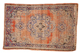 Distressed vintage Oushak rug with faded roundel medallion, abrashed dusty rose and cobalt blue. 2'8
