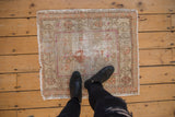 Distressed Oushak square rug with faded medallion, floral finials, worn beige, blush tones.