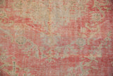 Distressed Oushak carpet pile showing worn knot heads and foundation, blush, ivory, seafoam.