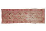 Distressed Oushak rug runner, fuchsia, ivory, and coffee brown geometric medallions, 2'10