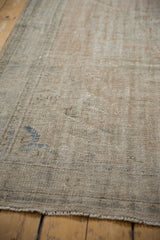 Textured, worn pile of a vintage distressed Oushak rug, showing foundation and knot heads.