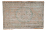 Distressed Oushak rug featuring faded pale beige and seafoam Rococo medallion, 2'10