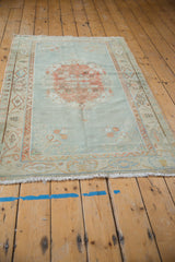 Distressed vintage Oushak rug, muted powder blue and faded rose tones, even pile wear, 3'5