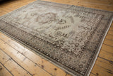 Chocolate brown border framing distressed antique ivory field with faint foundation showing.