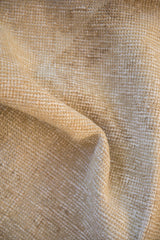 Visible hand-knotted foundation and textured weave of the vintage Oushak runner.