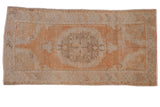Vintage Distressed Oushak runner, roundel floral medallion, abrashed tangerine, ivory, and oxidized silver.