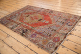 Vintage Oushak rug corner with phenomenal tree of life spandrel, rust, blue borders, and fringe.