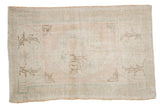 Vintage Distressed Oushak rug, faded roundel medallion showing even wear, beige rose and seafoam.