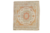 Distressed vintage Oushak square rug, stylized pomegranate medallion, ivory, terra cotta, and gold.