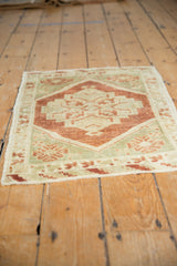 Oushak corner: stepped medallion, floral vinery, copper, ivory. Mostly even wear.