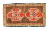Hand-knotted Distressed Oushak mat, coffee brown with orange rust ram's horn medallions.