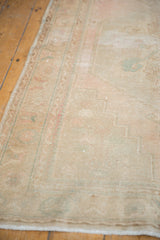 Distressed vintage Oushak runner pile, showing even wear and subtle blush and sand tones.