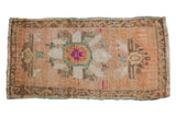 Distressed vintage Oushak rug with oversized floral design in peach, ivory, and turquoise. 1'10