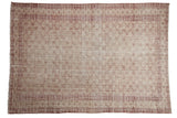 Distressed Oushak carpet with faded black cherry red, ivory, and beige allover trellis.