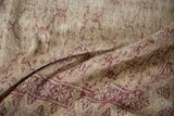 Distressed Oushak texture, muted red and ivory, showing mostly even wear to foundation.