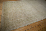 Secured side cord selvage and distressed pile with even wear and wefting speckles.