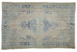 Distressed Oushak carpet, ivory field, faded pale blue medallion and green motifs. 5'7