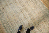 Distressed Oushak carpet, pale lattice floral motifs, mostly even wear, foundation visible.