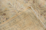 Distressed Oushak carpet's even pile wear, visible foundation, and striped reverse side.