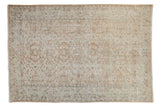 Distressed vintage Oushak carpet, allover faded apricot, antique ivory, charcoal, and teal vinery with textured wear.