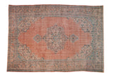 Distressed vintage Oushak carpet with open pale blush field and central medallion, 7'2